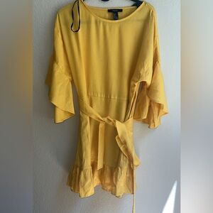 Yellow romper with wrap skirt